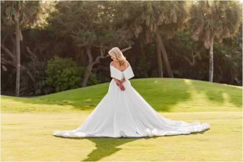Back of dress on golf course during Melbourne Beach vow renewal inspired shoot