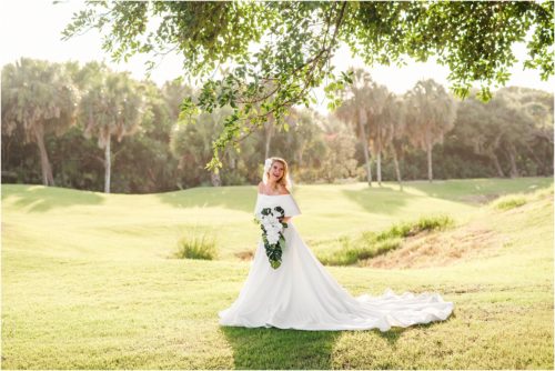 Bride on golf course during Melbourne Beach vow renewal inspired shoot