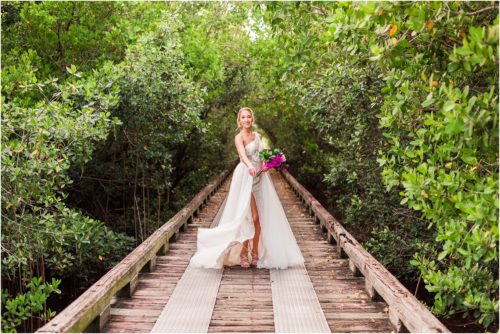 Bride twirling dress during Melbourne Beach vow renewal inspired shoot
