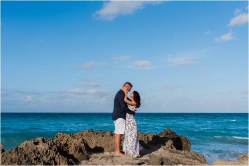 couple standing on rocks House of Refuge Engagement session