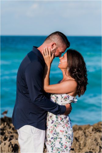 girl holding man's head House of Refuge Engagement session