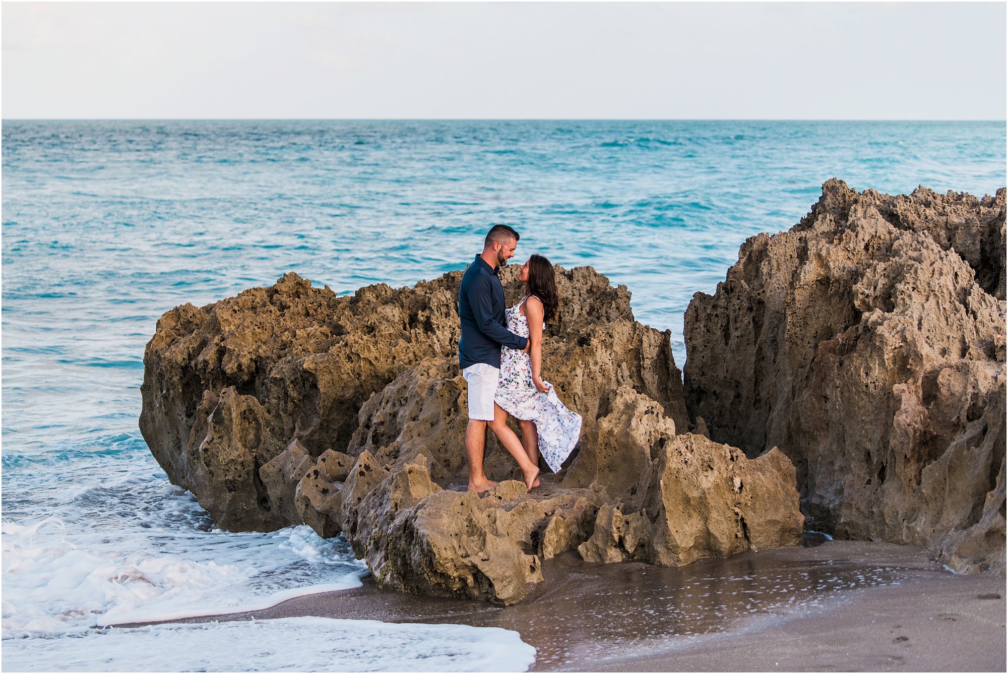 Couple standing on rock House of Refuge Engagement session