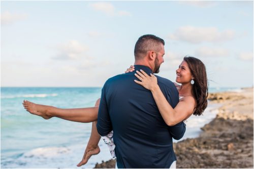Man holding woman House of Refuge Engagement session