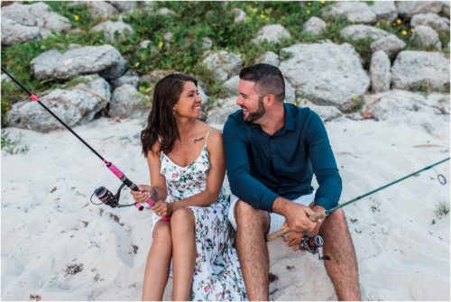 couple fishing by river