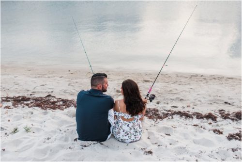 couple fishing by river