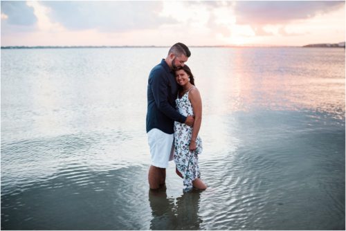 Couple hugging while standing in river