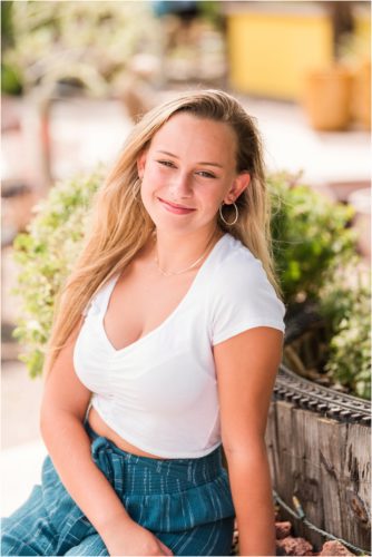 Senior sitting on bench at Rockledge Gardens