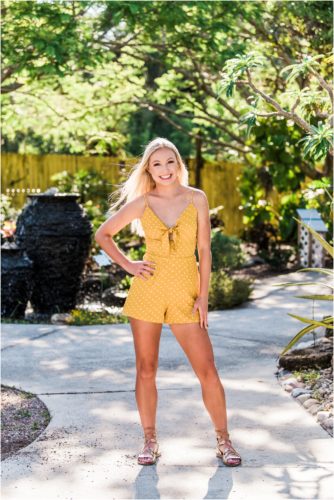 Girl in power pose Rockledge Gardens Senior Pictures