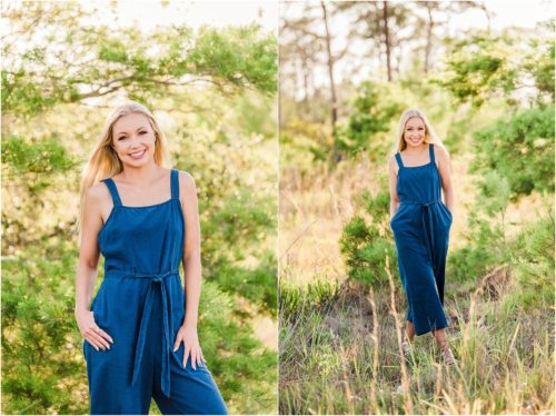 Girl in blue romper in field during Rockledge Gardens Senior Pictures