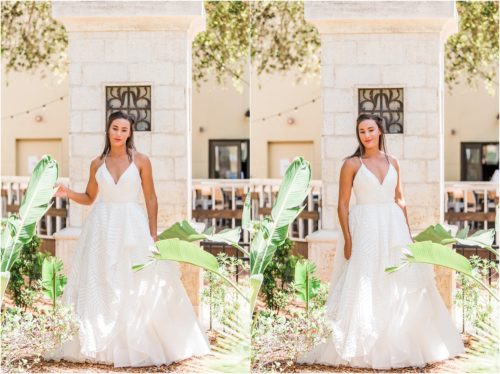 Bride standing by pillar in wedding dress