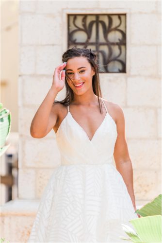 Bride moving hair from in front of her face. Melbourne Florida Wedding Photographer