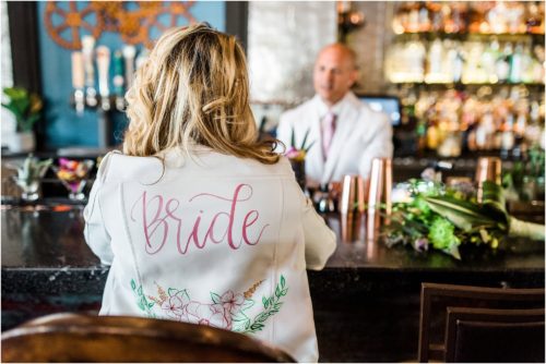 Bride wearing leather jacket in 28 north