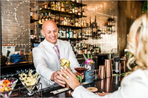 Groom serving drink in 28 North