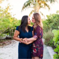 Same sex couple hugging on path Vero Beach Engagement Photographer