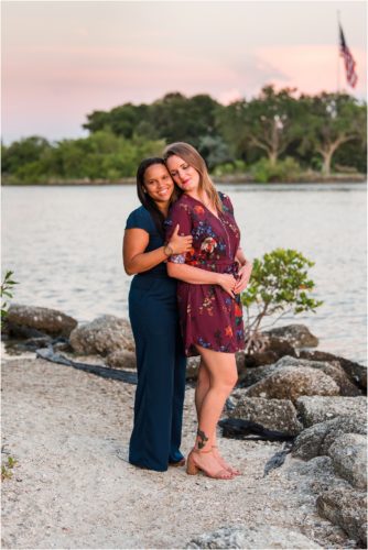 Couple with flag in background Vero Beach Engagement Photographer