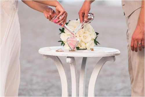 Unique Ceremony Ideas Pink and white sand ceremony in heart shaped bottle