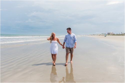 Couple holding hand on Cocoa Beach