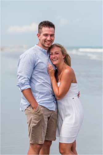 Couple hugging on beach