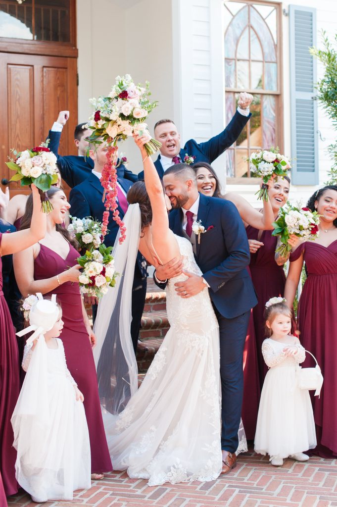 wedding party cheering with the bride and groom at the Estate on the Halifax wedding