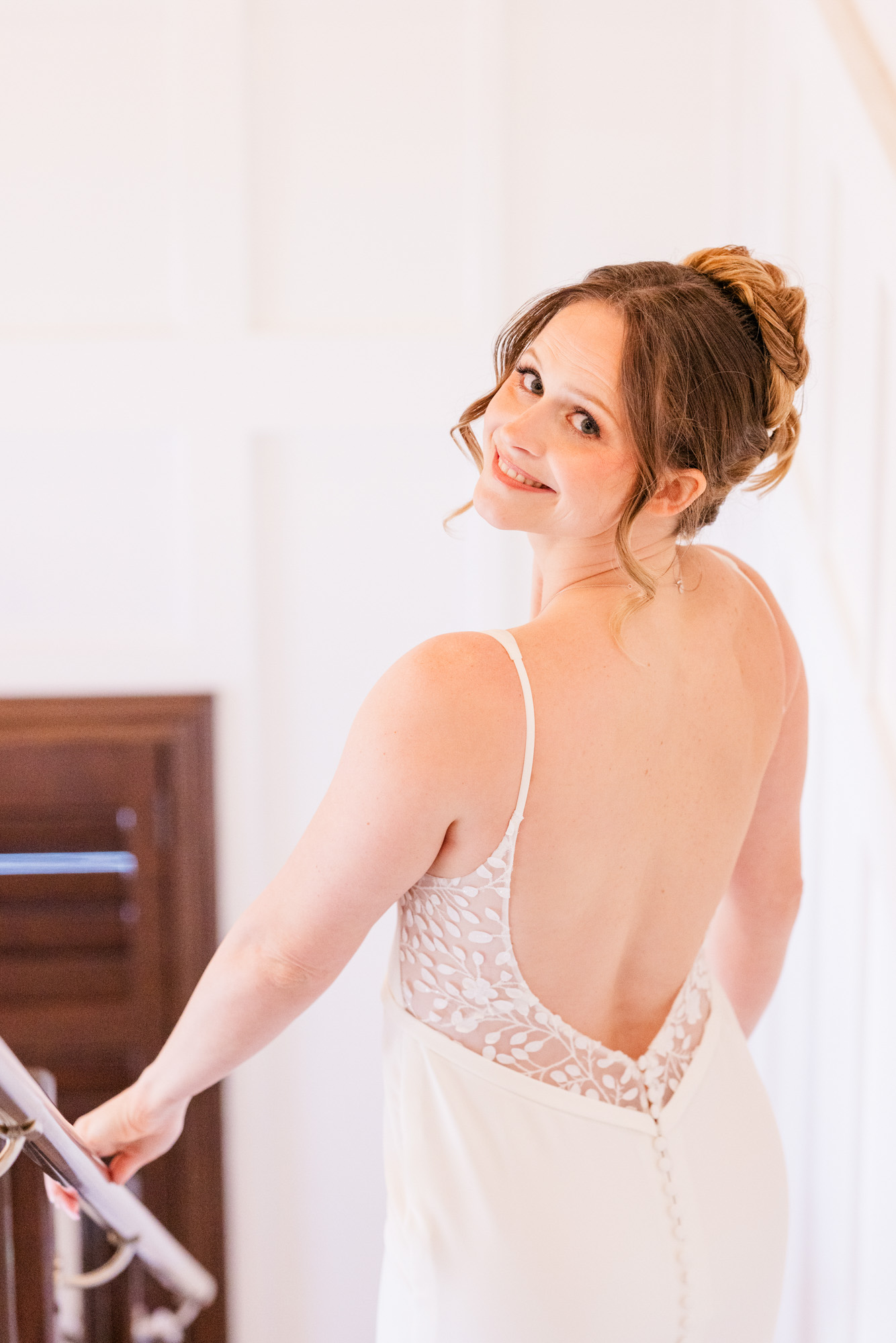 Harbour House Oceanfront wedding bride showing the lace back of her wedding dress.