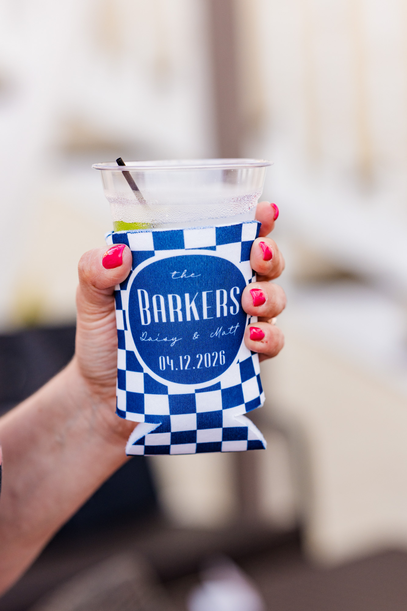Personalized blue and white wedding drink koozie for a Harbour House Oceanfront wedding.