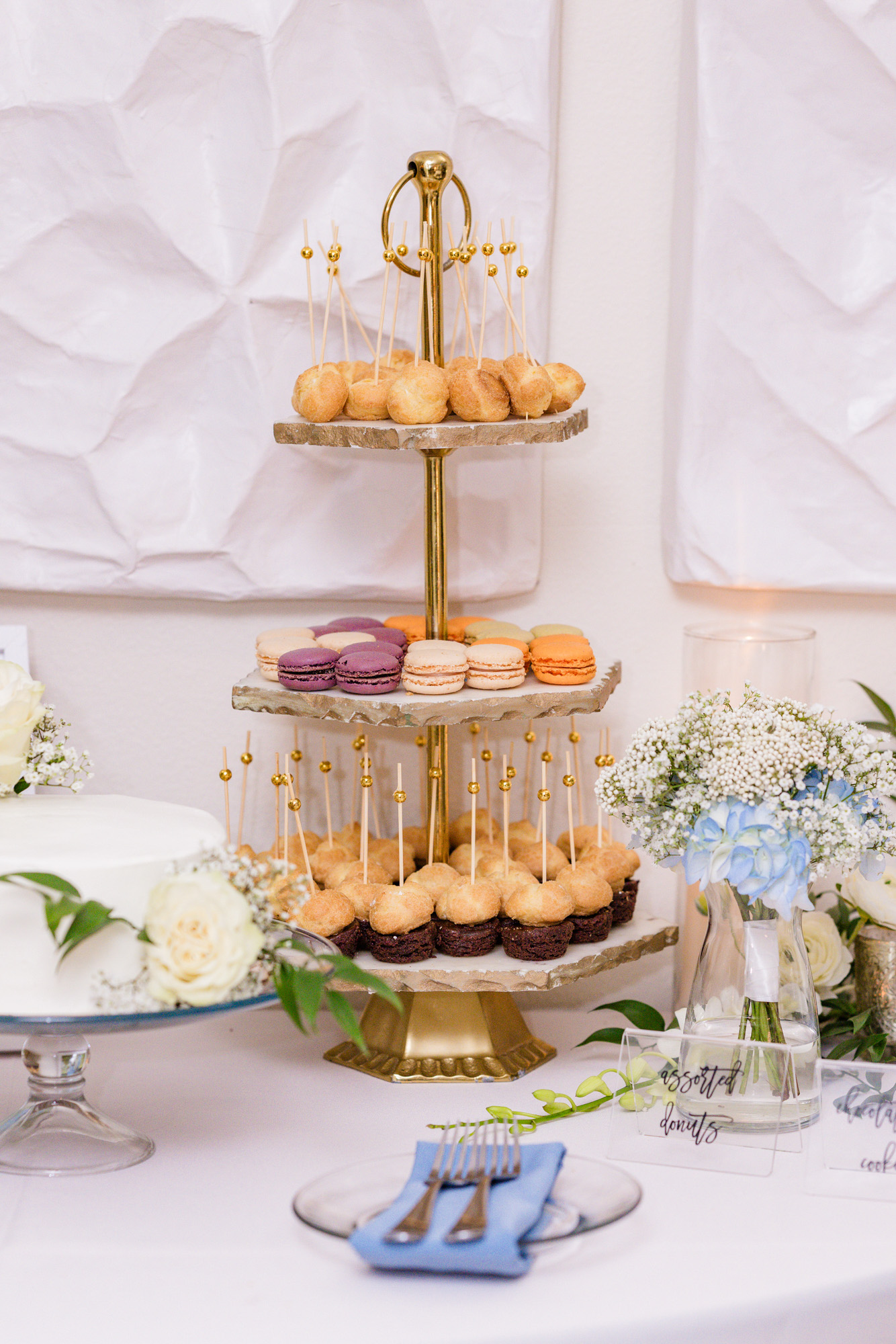 Wedding dessert display with macarons and assorted sweets at Harbour House Oceanfront.