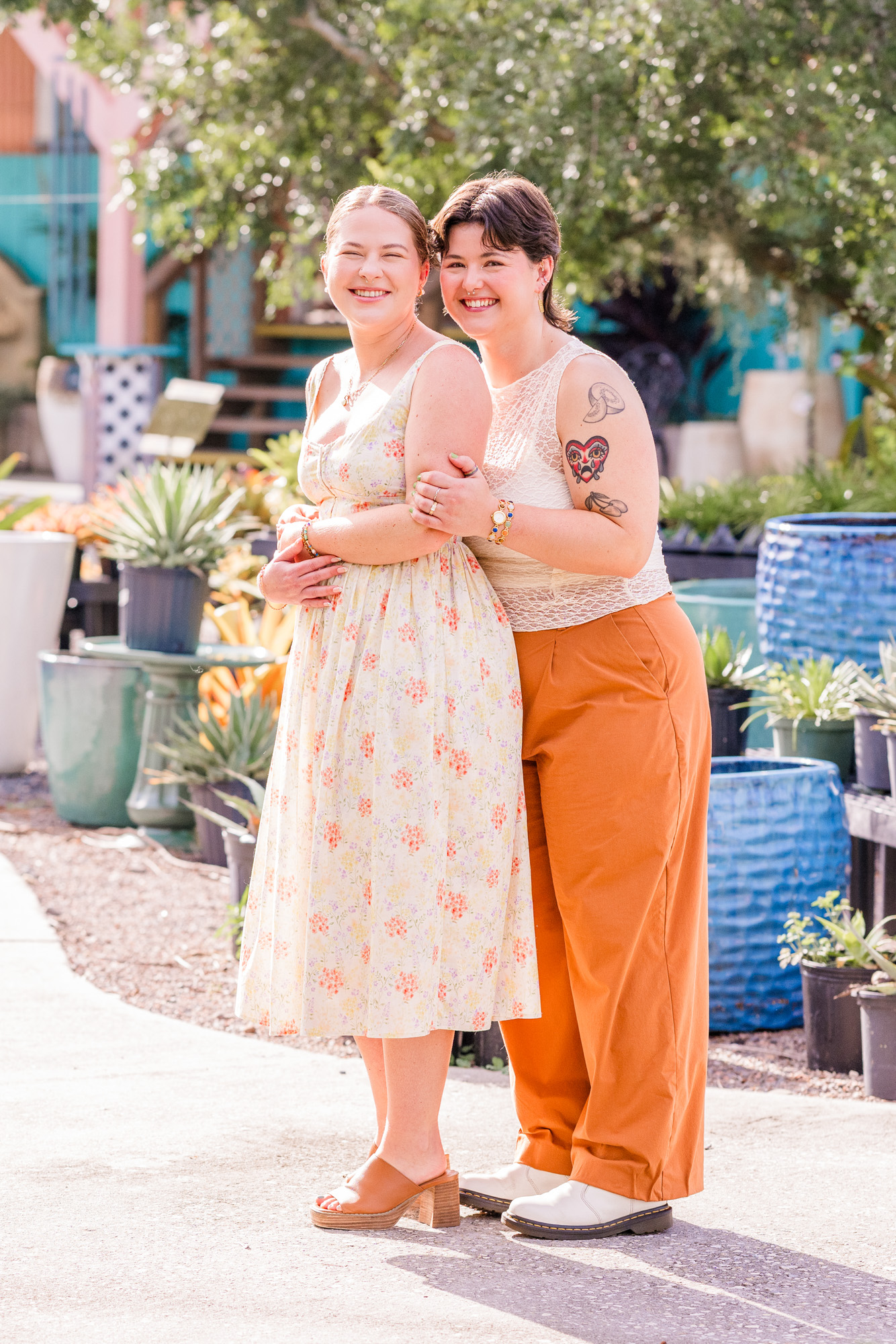 woman holding another woman from behind at their Melbourne, Florida engagement session