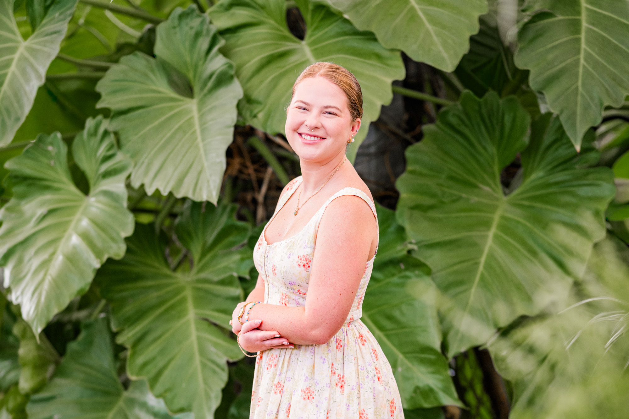 Singe photo of woman in front of tree