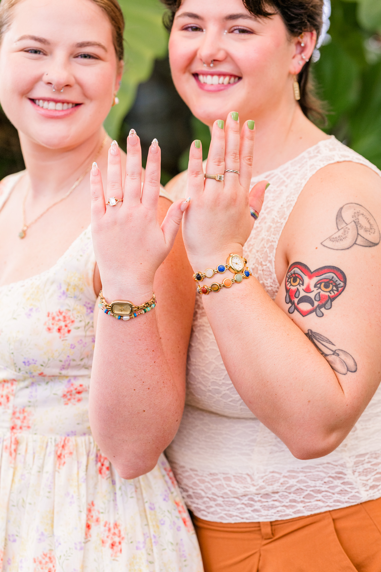 Couple showing off their rings