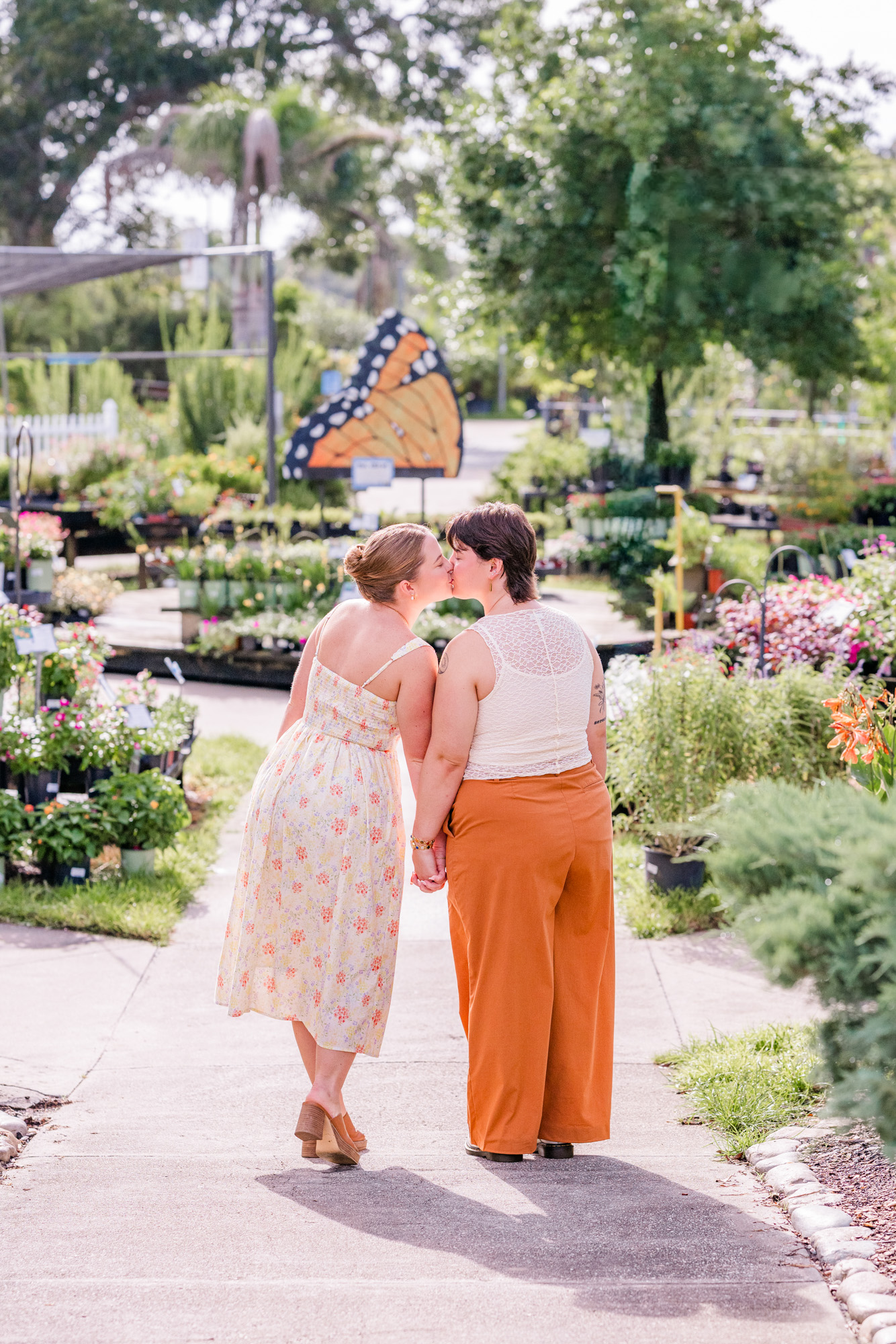 couple walking away holding hands