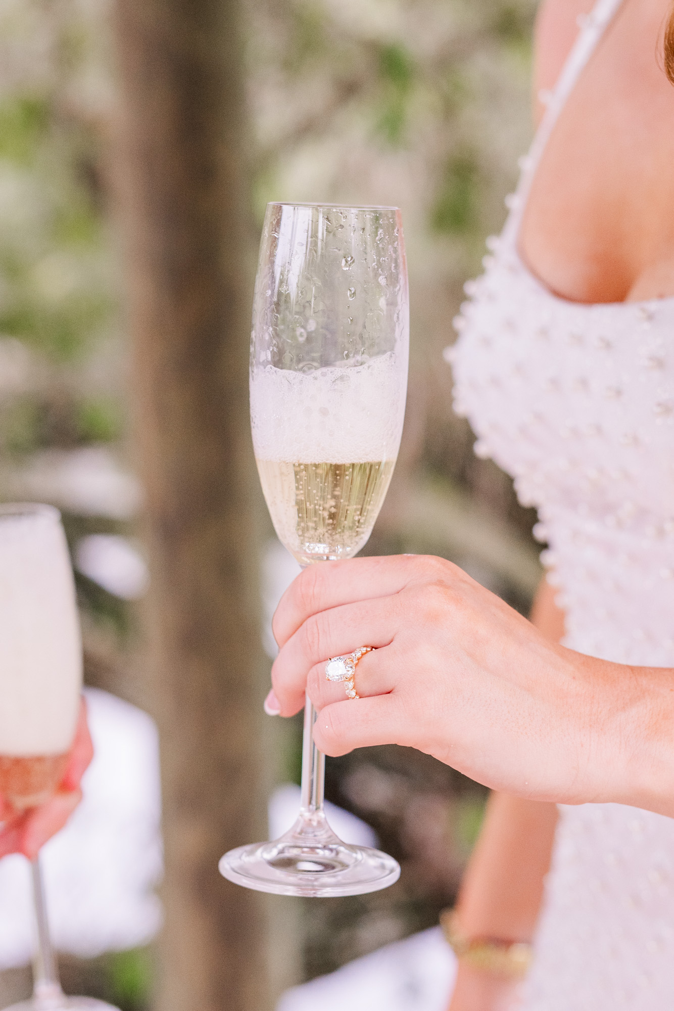 woman holding champagne class