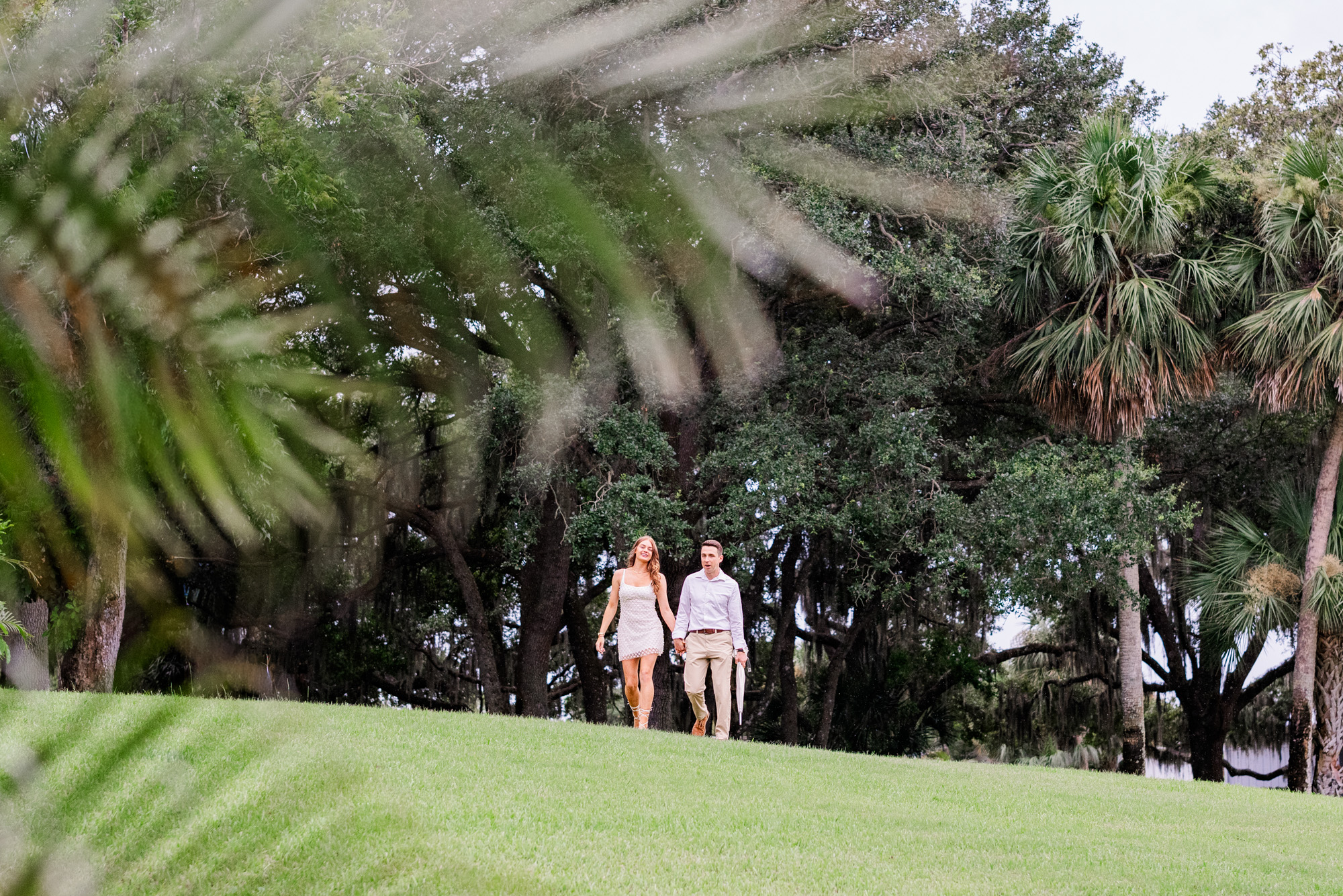 couple walking down hill
