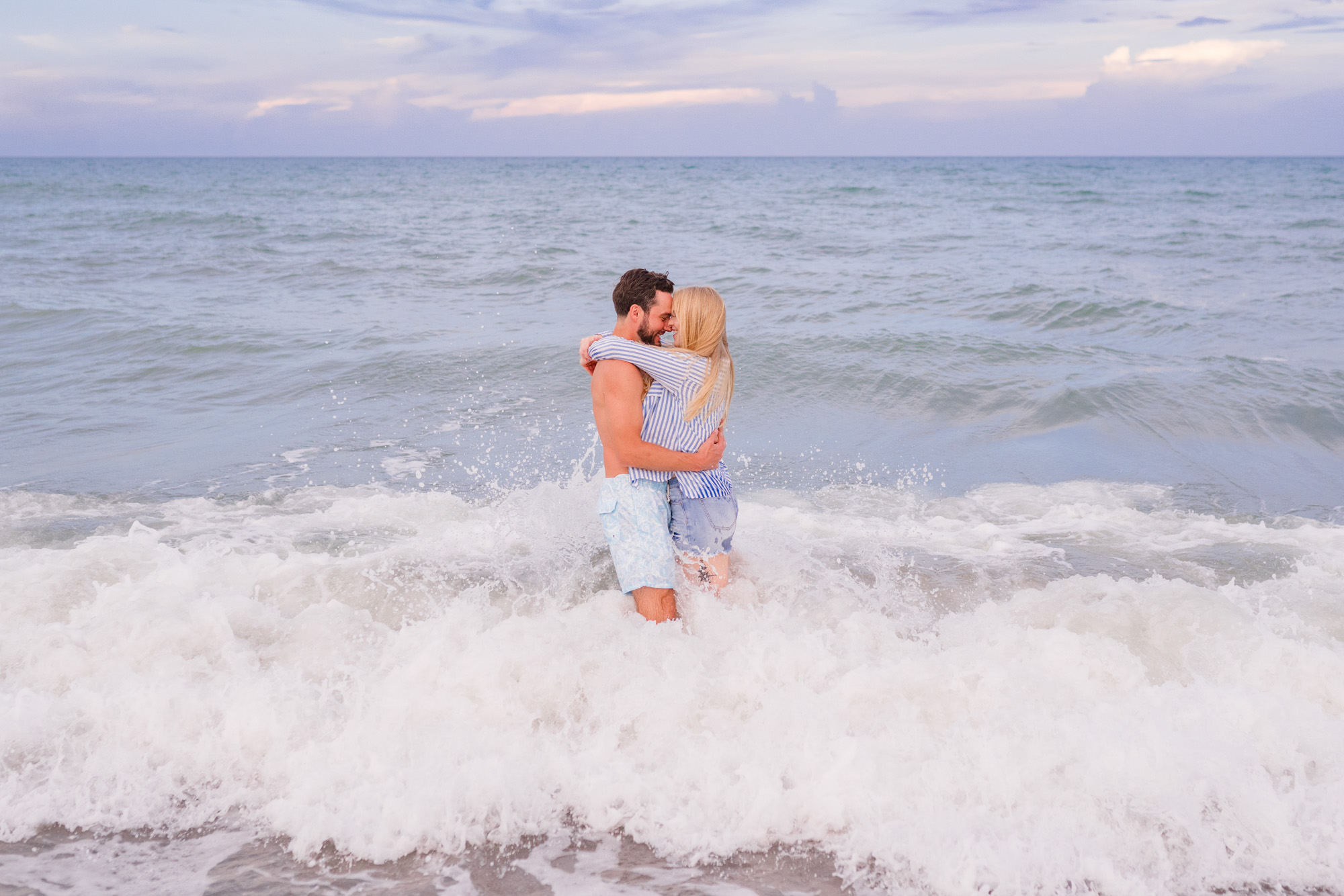 Couple hugging each other while in the water