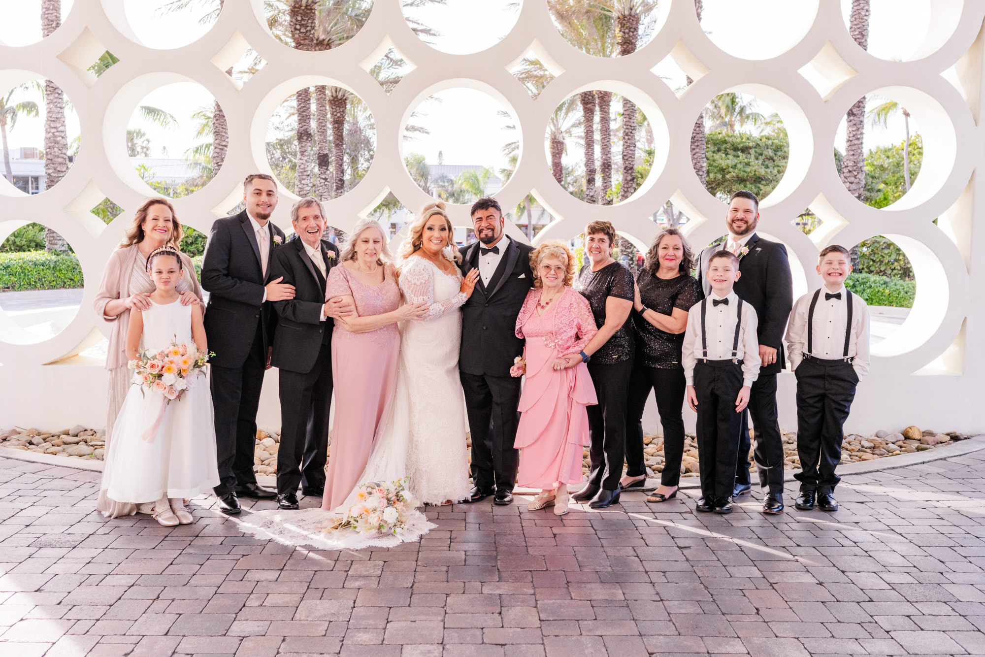 Large family portrait taken at Costa d'Este wedding in Vero Beach, Florida