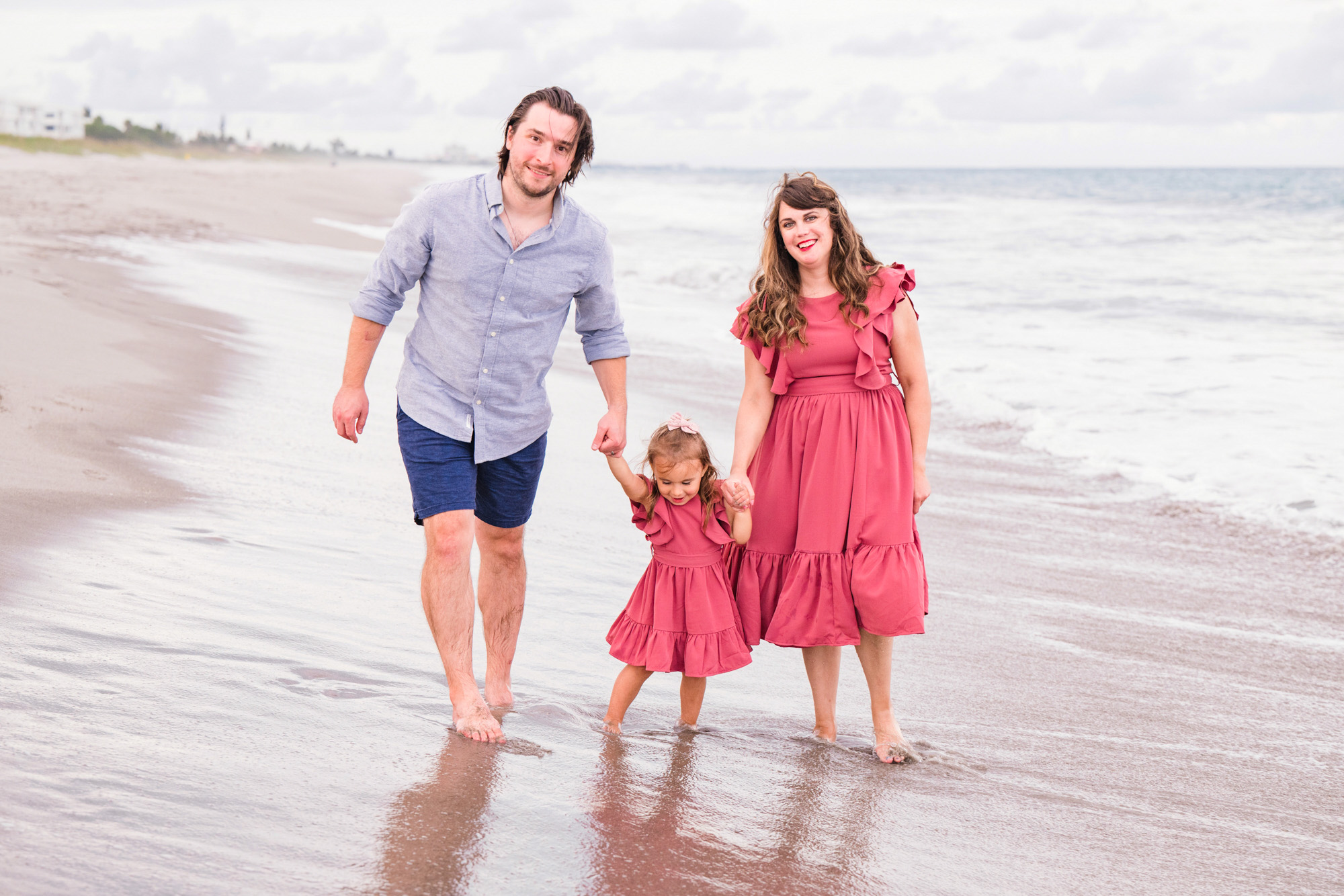 Family of three dressed for their family session