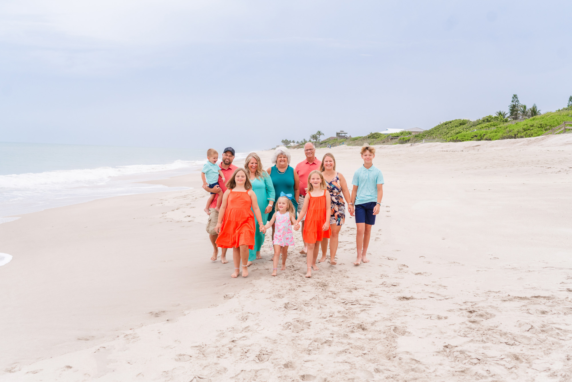 family dressed in bright colorful outfits