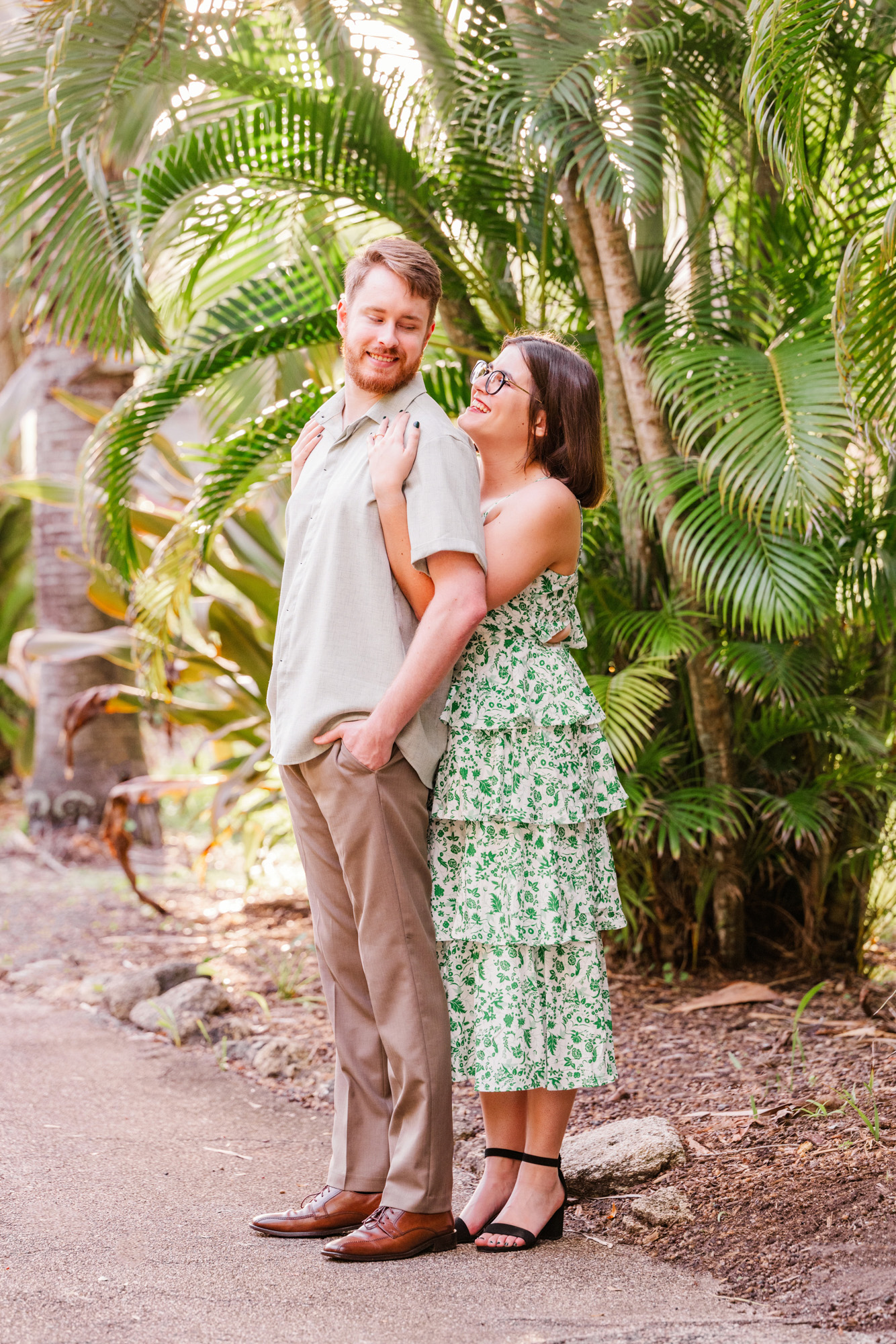 Full length picture of girl hugging boy at the Florida Tech Botanical Gardens
