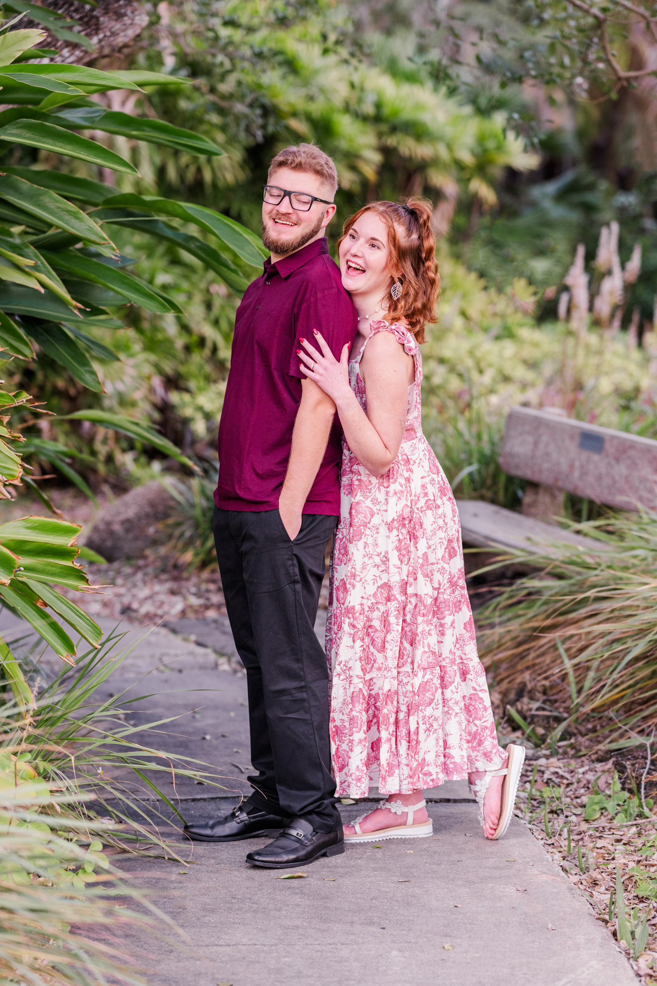 Woman hugging man from behind during their Florida Tech engagement session