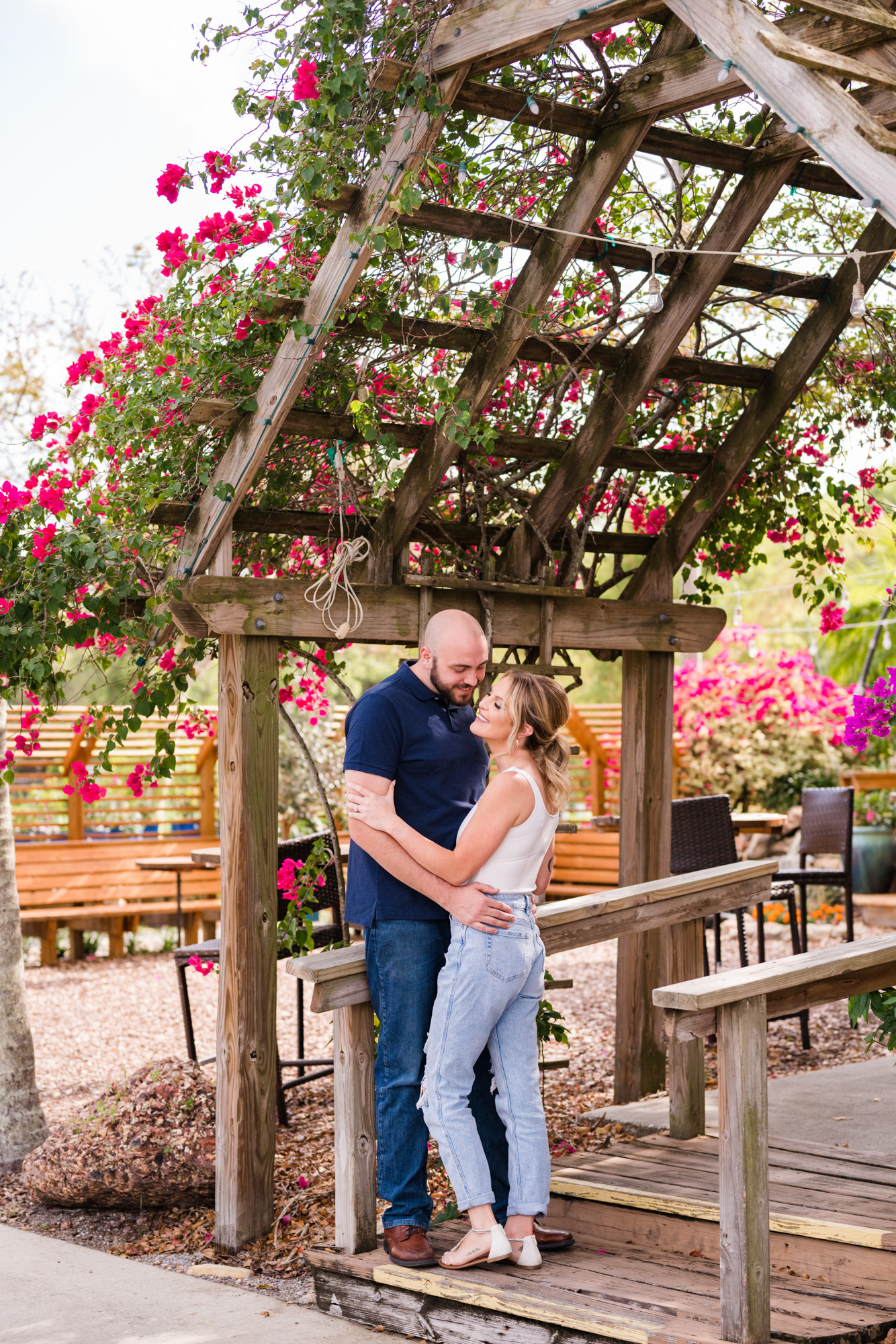 Mand and woman hugging in a different outfit at Rockledge Gardens