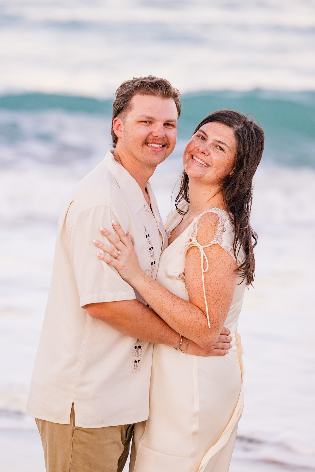 close up pictue of man and woman hugging