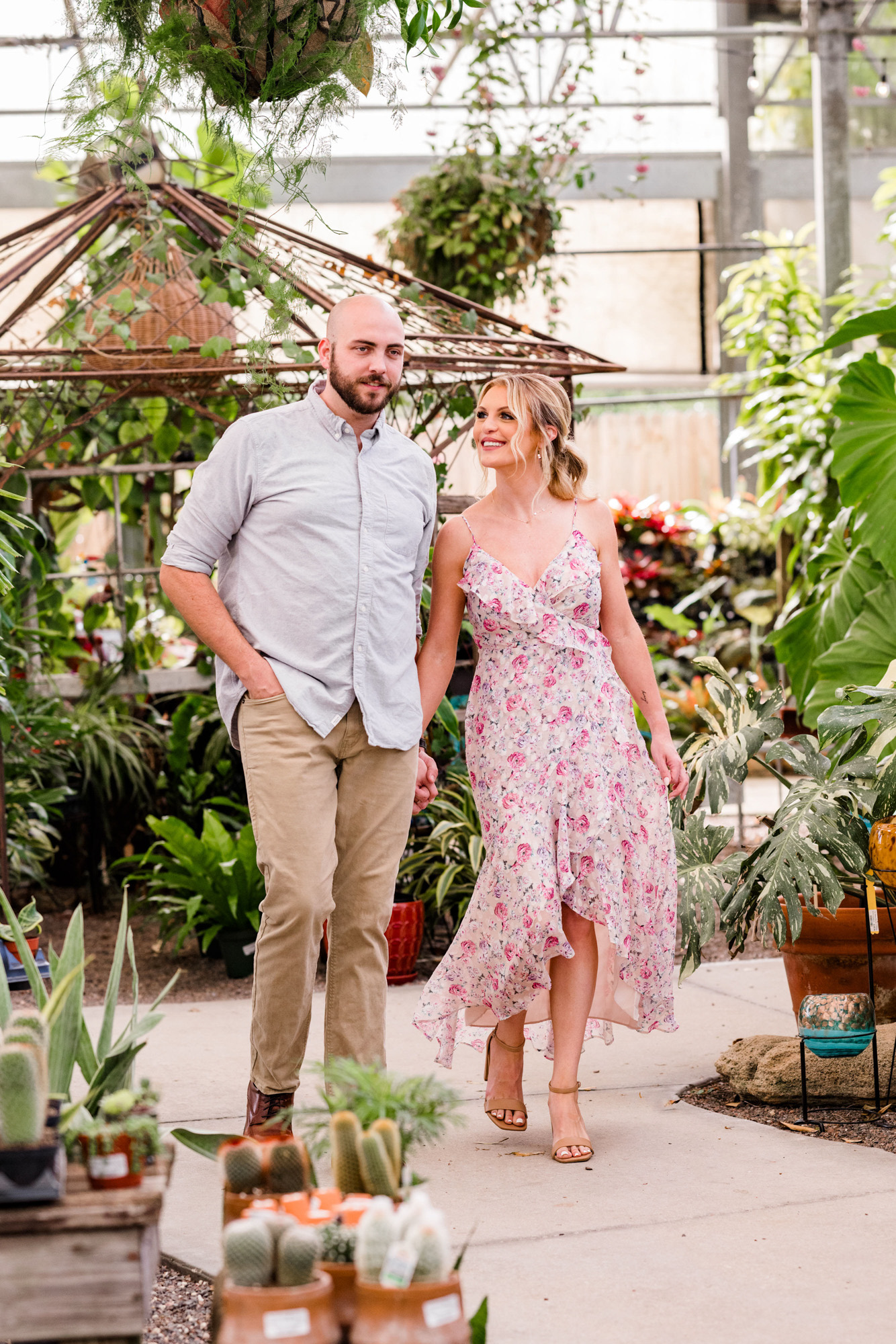 Man and woman walking at Rockledge Gardens engagement session