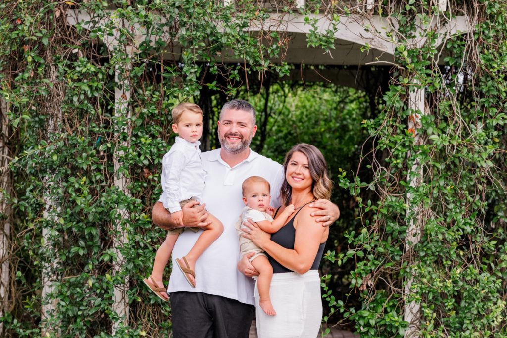family holding kids in vero beach
