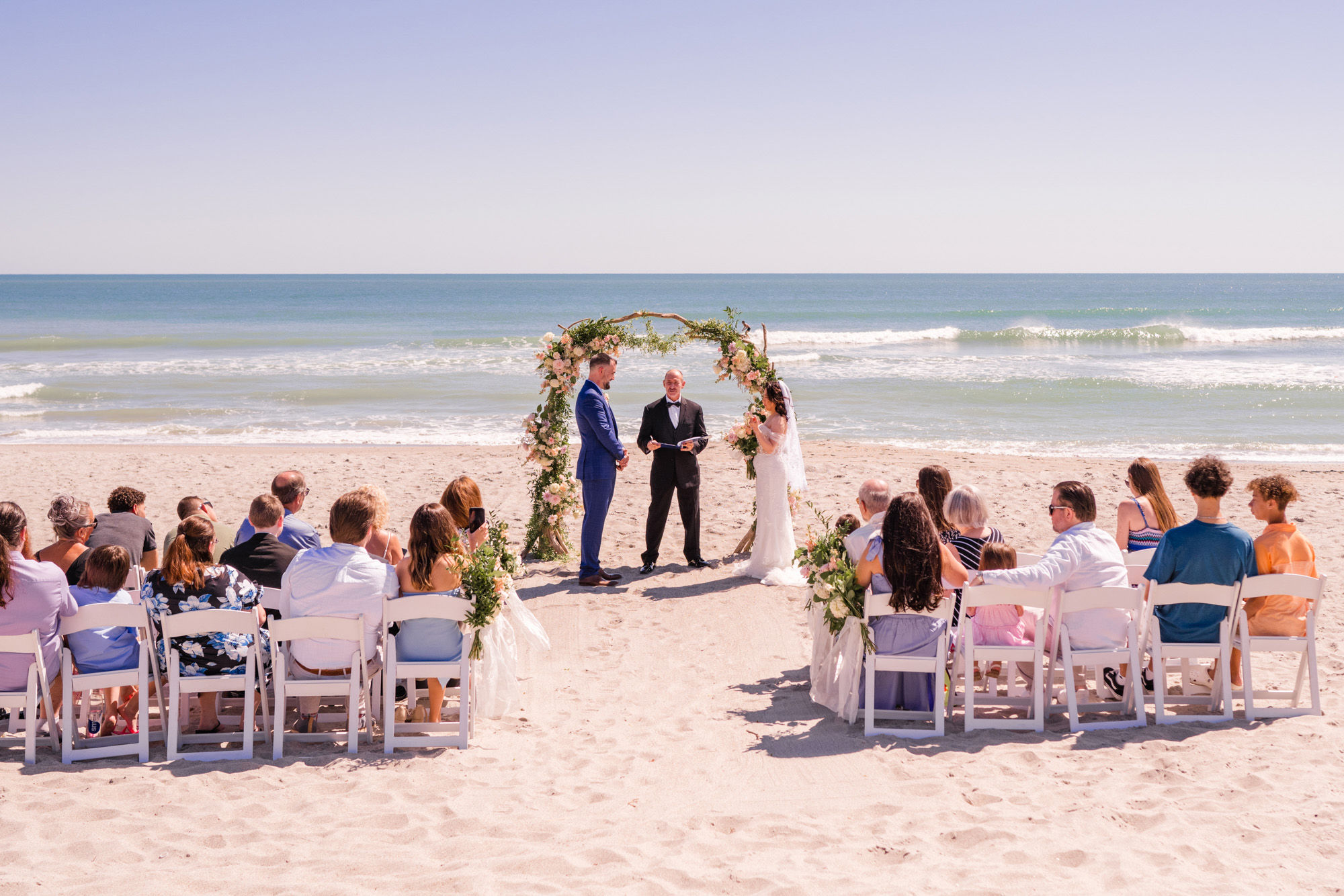 Wedding ceremony held on the beach in the mornig in Melbourne beach