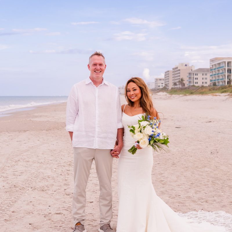 Bride and groom standing together after their Melbourne Beach Wedding