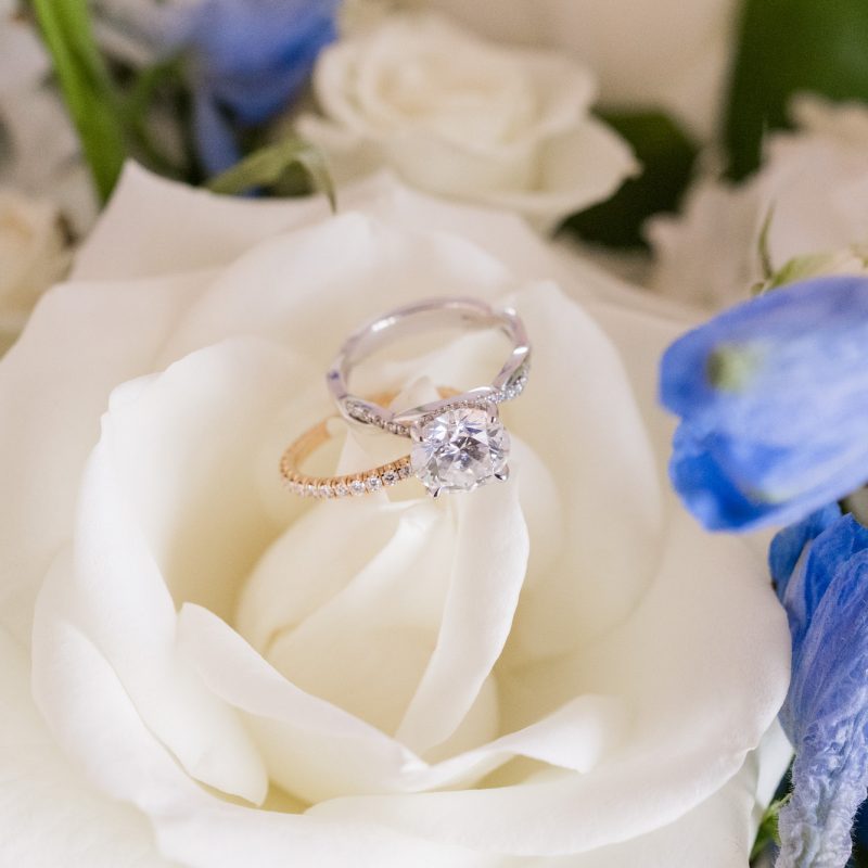 wedding ring on a white flower
