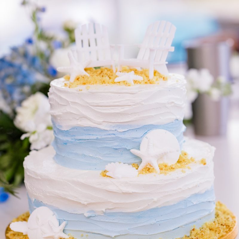photo of wedding cake that looks like sand castle