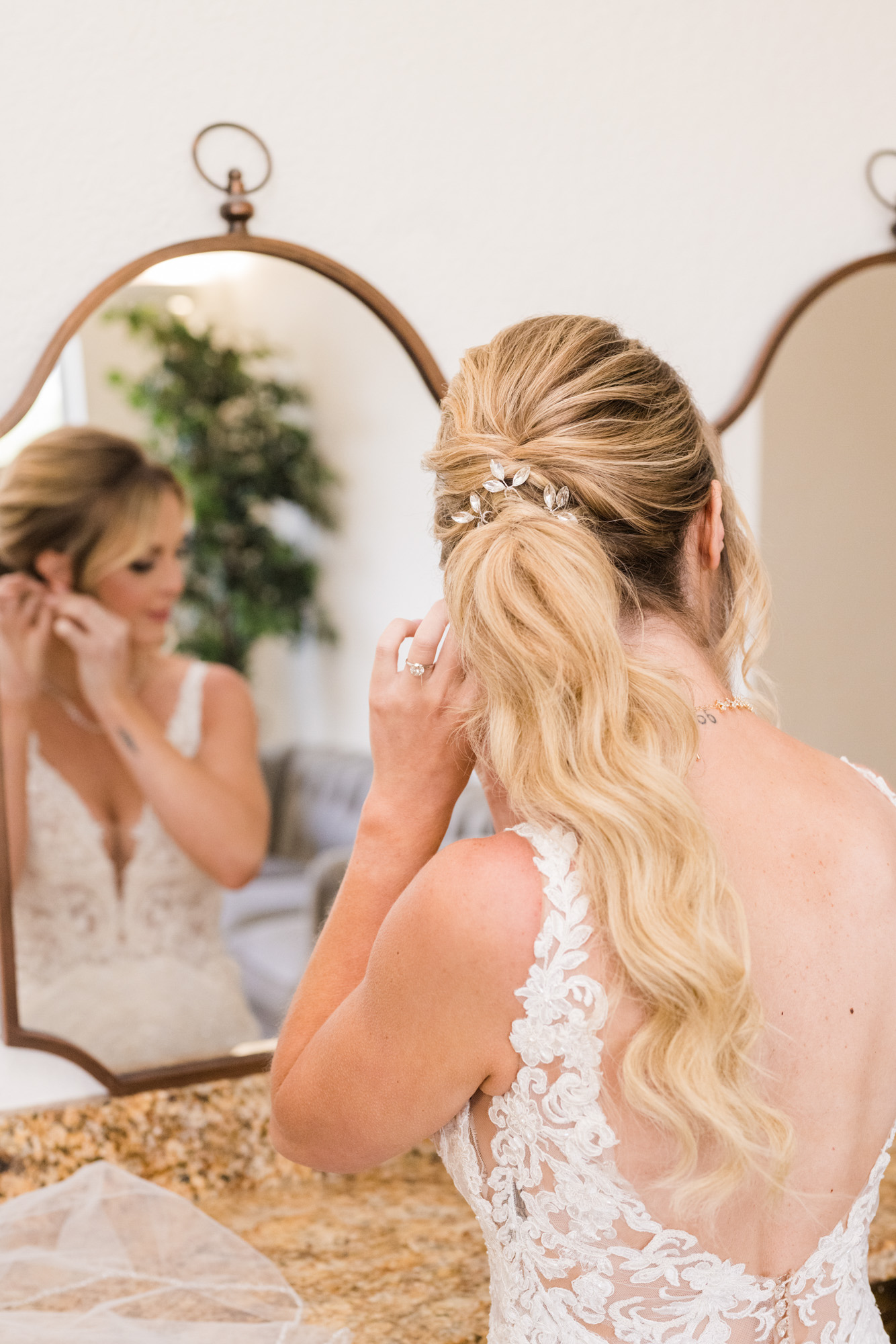 bride looking in mirror