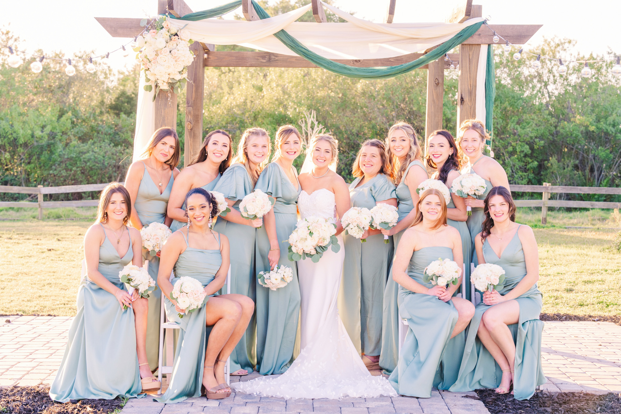 group of 12 bridesmaids dressed in green at a Melbourne, Florida wedding