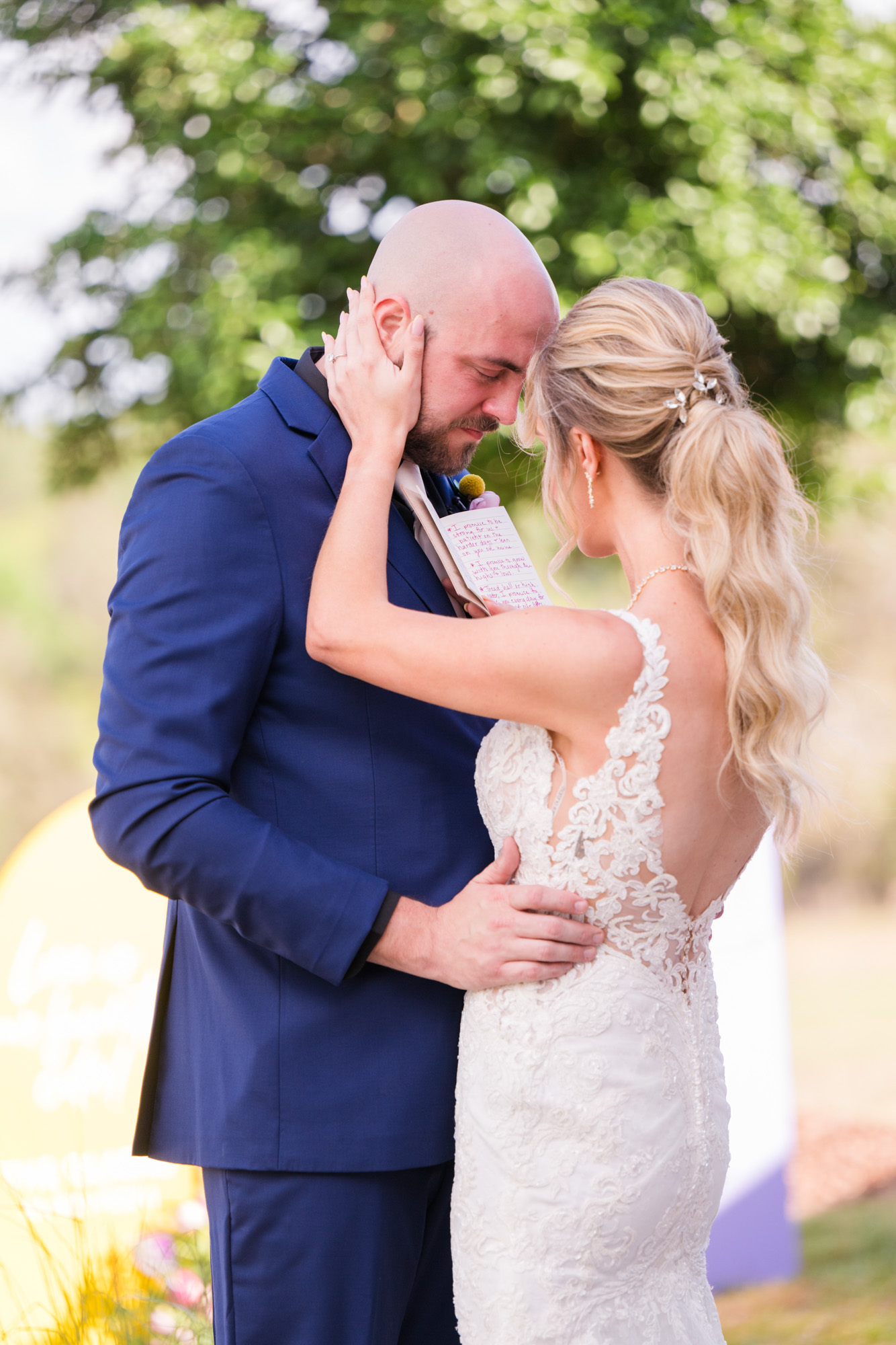 bride and groom embracing during their first look