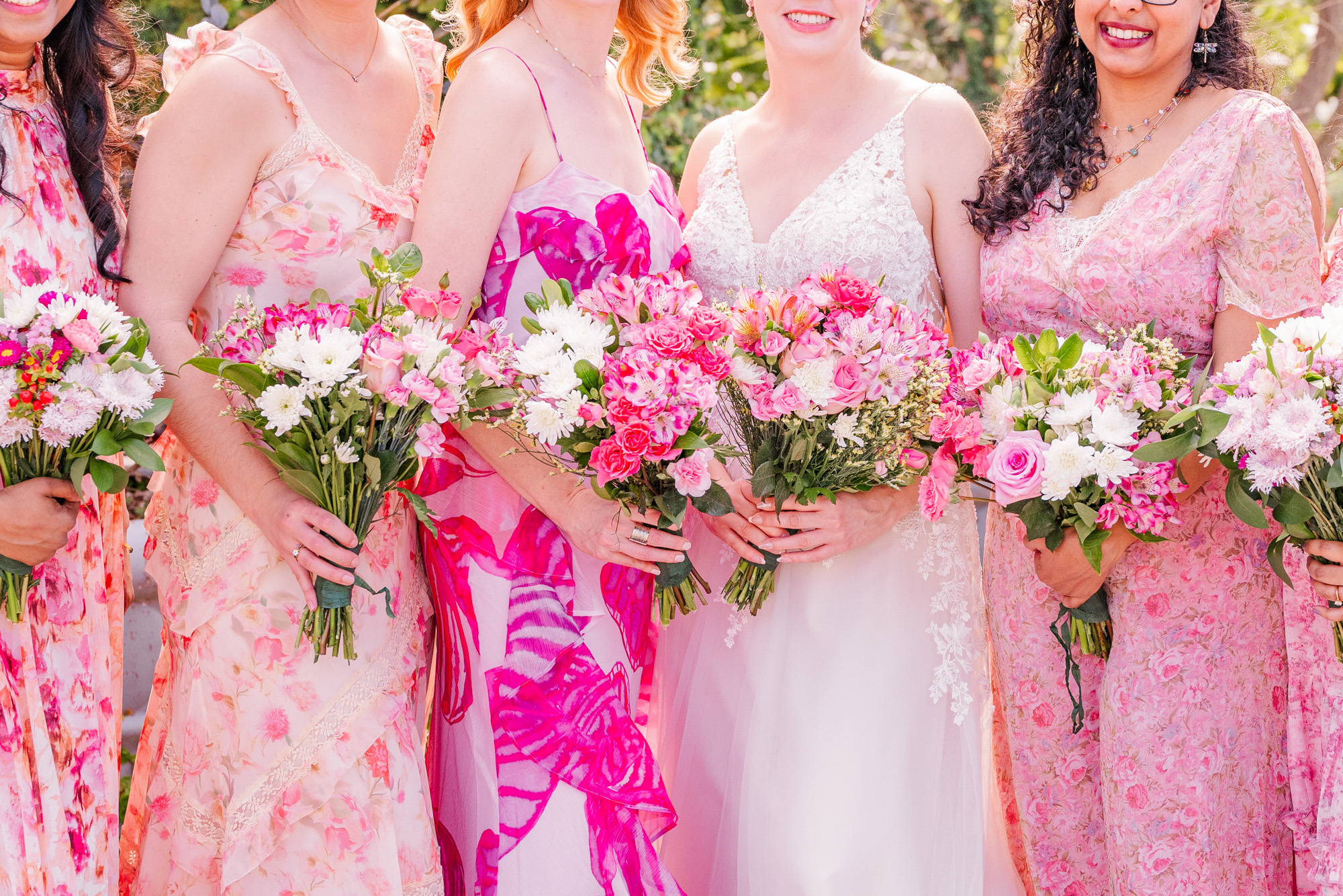 shades of pink flowers and pink bridesmaid dresses at Rockledge Gardens wedding